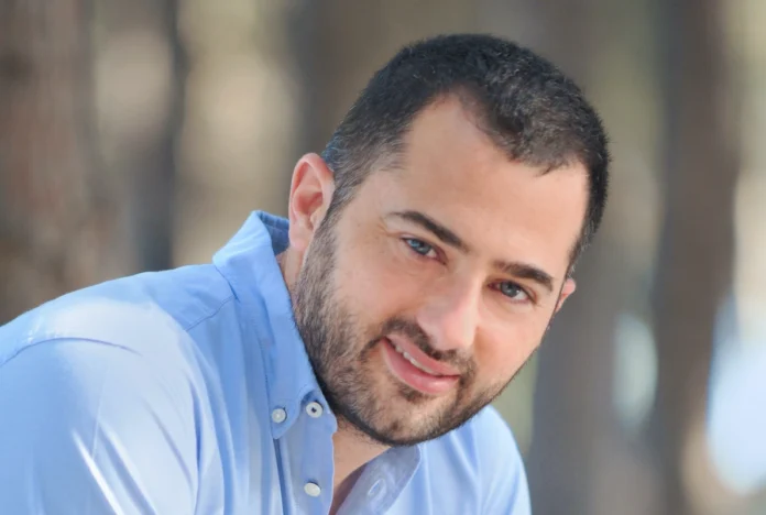 A professional portrait of Fanis Spanos, Governor of Central Greece, looking toward the camera. He is a young politician with a focused expression, representing the leadership of the Sterea Ellada region.