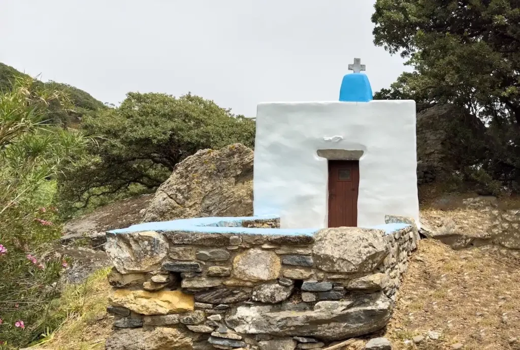 Small whitewashed private chapel in Tinos, reflecting the island’s tradition of nearly 1,000 chapels and churches.