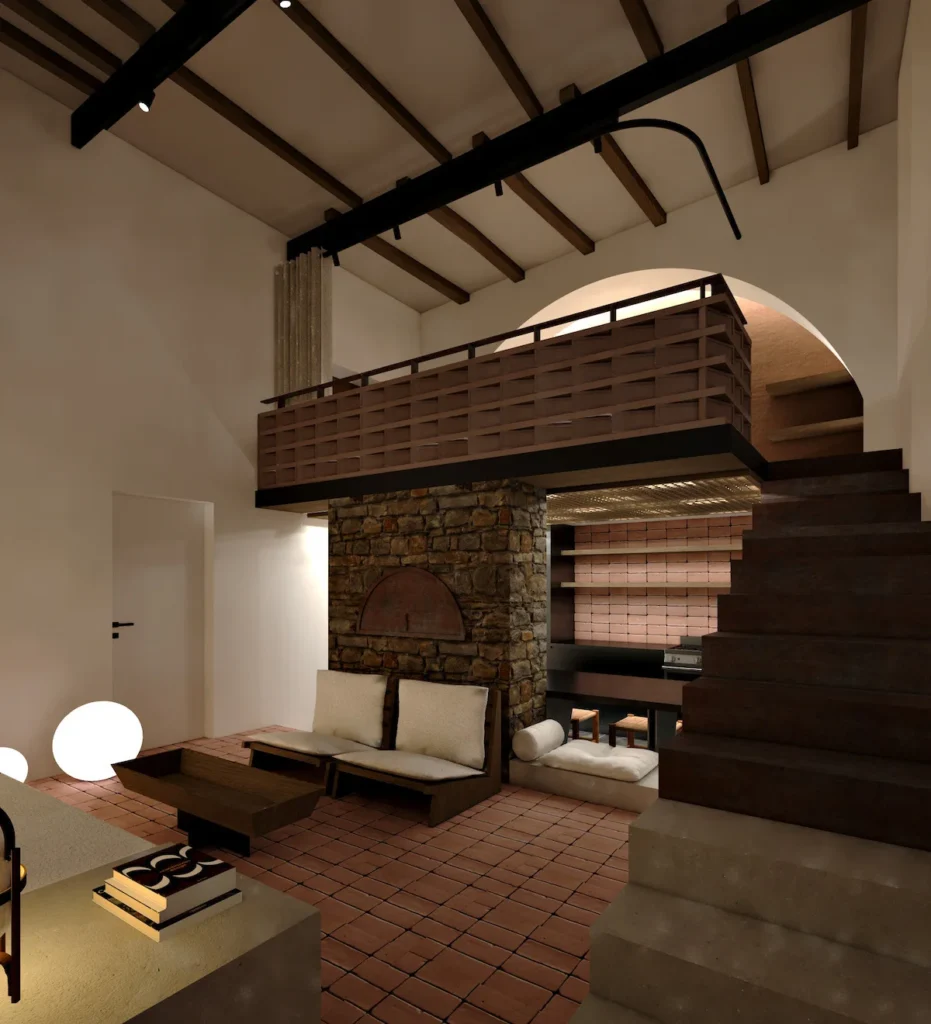 A renovated interior of a former bakery, featuring high ceilings, original stone elements, and a modern open-plan living area.