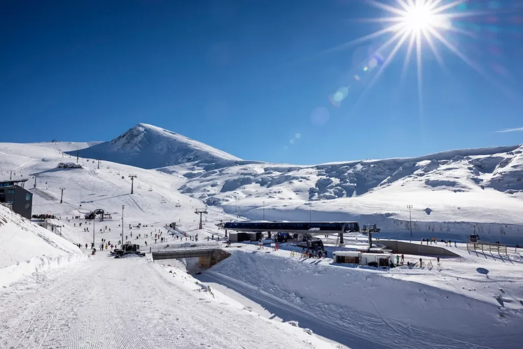 Snow-covered slopes and ski lifts at Kellaria, Mount Parnassus.