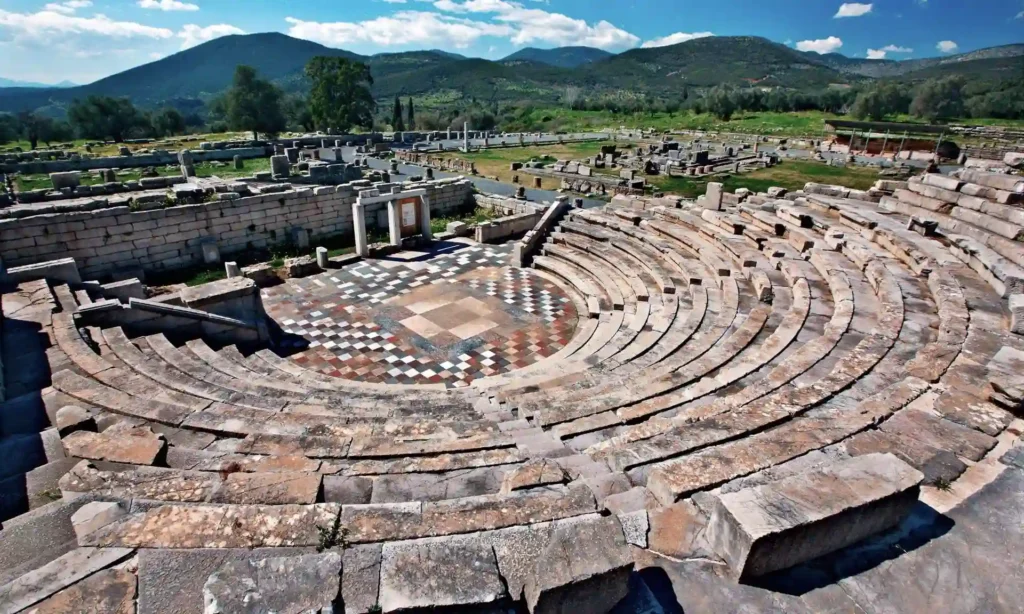 Detailed view of the stone tiers and orchestra of the Ancient Theatre of Messene.
