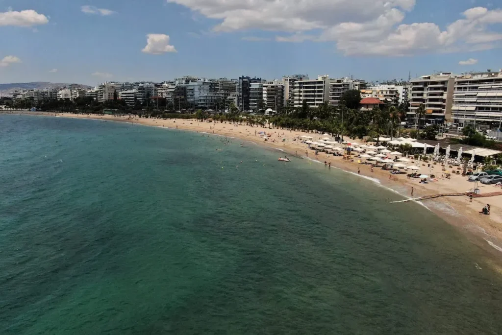 Close-up of the clear blue waters at Palaio Faliro beach, illustrating the clean conditions of the Saronic Gulf.