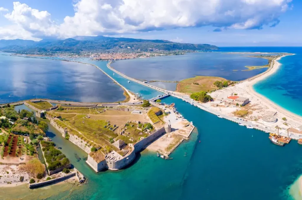 Aerial view of the narrow metal swing bridge connecting the Greek mainland to the entrance of Lefkada island.