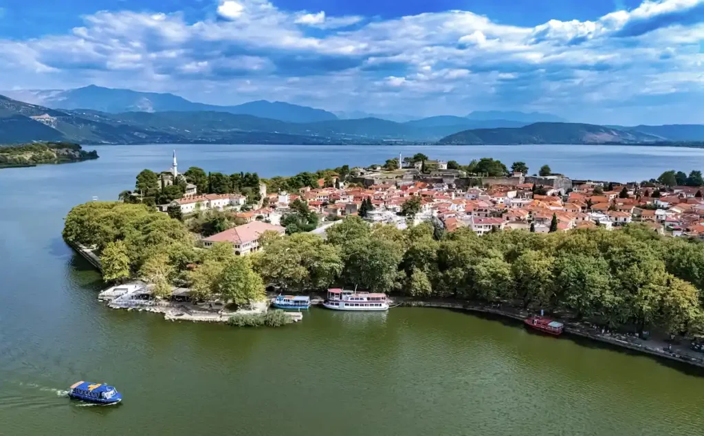 Aerial view of the Ioannina peninsula with lake and Ottoman minarets