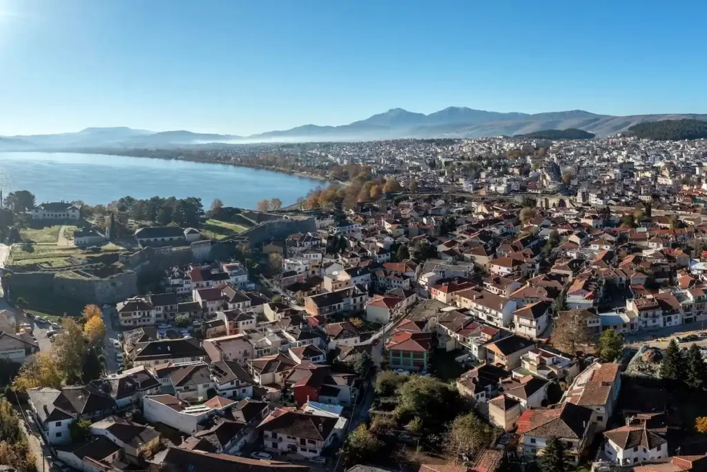 Aerial view of Ioannina showing traditional rooftops and Lake Pamvotis