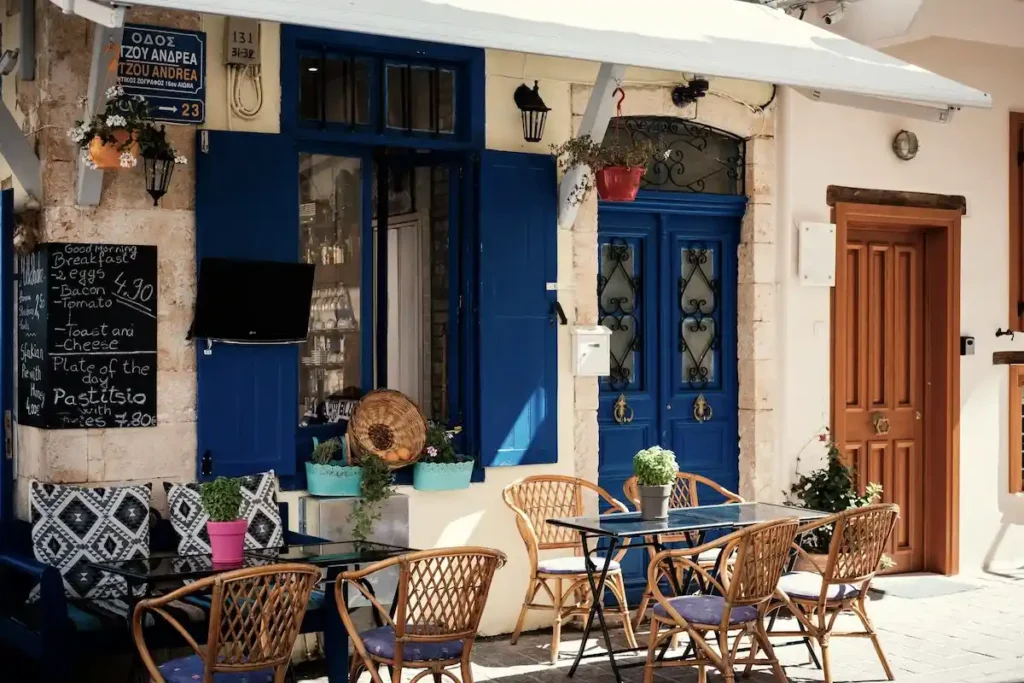 A contemporary café in Chania with seating and coffee equipment